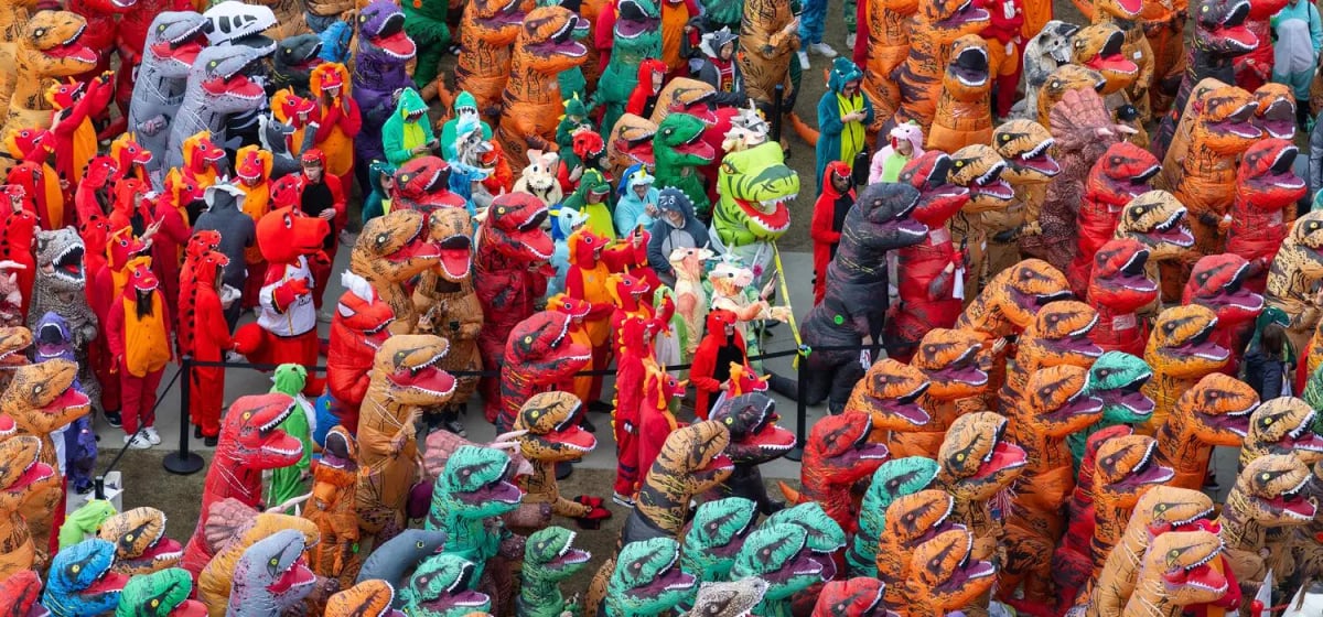 University of Calgary Breaks Guinness World Record With 682 People in Dinosaur Costumes