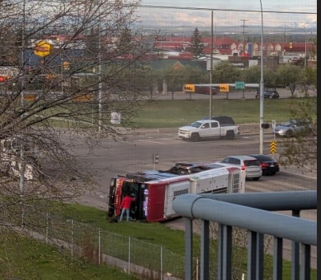 Calgary Transit Bus Knocked onto Its Side by Gravel Truck During Morning Rush Hour in SE