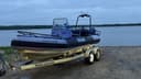 Parkland RCMP Rescued a Man and Two Children Stranded on a Lake Northwest of Edmonton After Their Boat Motor Failed